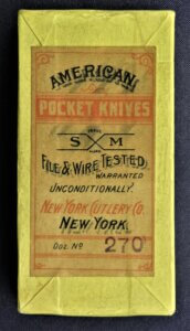 A yellow knife box from "New York" 