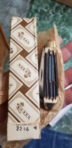 Cardboard box, chipped bark knife, Queen Cutlery 