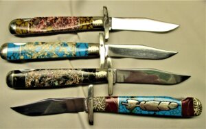Swing guards with both "Queen" and "Yellowhorse" tang stamps customized by Painted Pony knives 